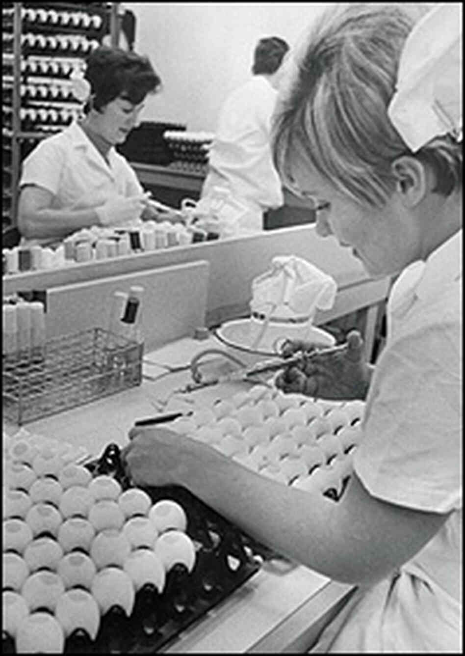 A lab assistant inoculates fertile eggs with Hong Kong influenza Virus in 1968. A lab assistant inoculates fertile eggs with Hong Kong influenza Virus in 1968.