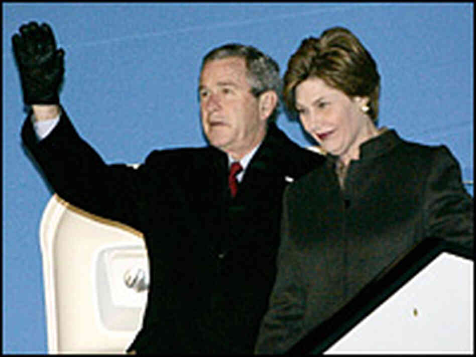President George W. Bush arrives with first lady Laura Bush at Brussels Airport. Reuters President George W. Bush arrives with first lady Laura Bush at Brussels Airport. Reuters