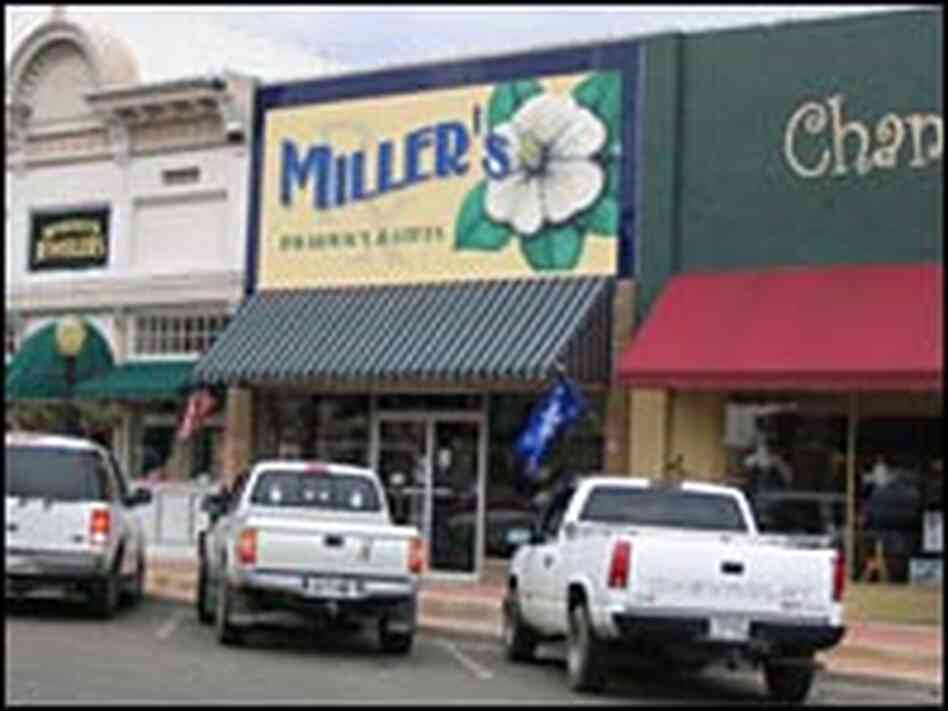 Pickup trucks are common in Magnolia, Ark., where storefront shops still line the town center. Pickup trucks are common in Magnolia, Ark., where storefront shops still line the town center.