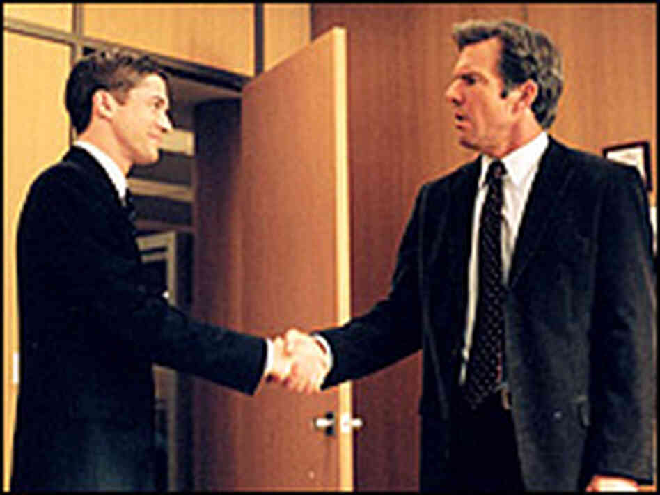 Dennis Quaid, right, andTopher Grace. Universal Pictures Dennis Quaid, right, andTopher Grace. Universal Pictures