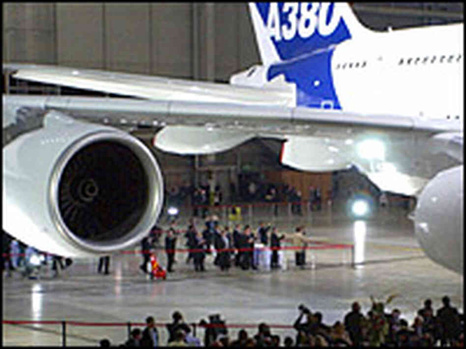 Airbus officials unveil the new plane with European leaders. Airbus officials unveil the new plane with European leaders.