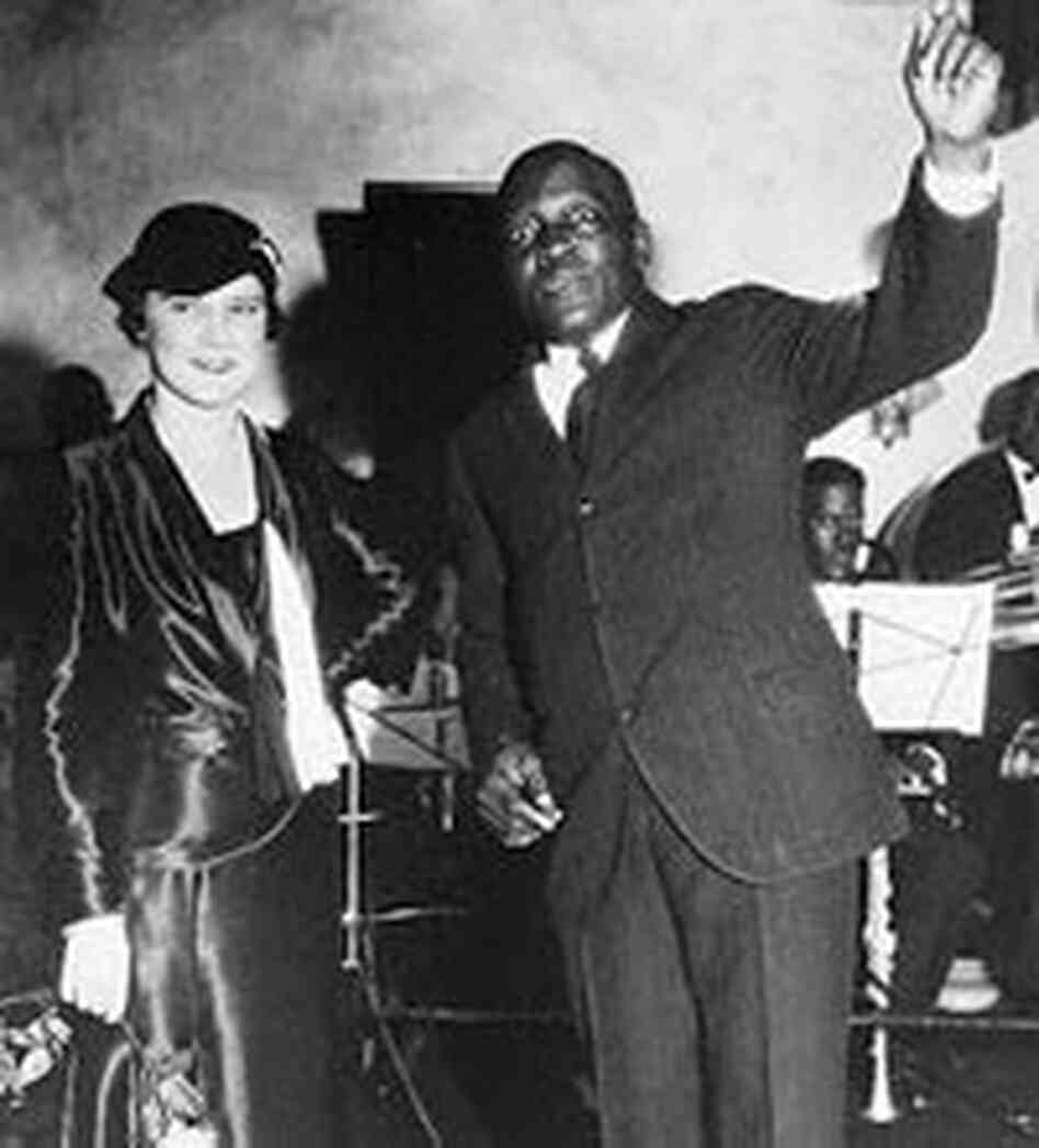 Jack Johnson and his fourth wife, the former Irene Pineau, at the 1931 opening of his new nightclub Jack Johnson and his fourth wife, the former Irene Pineau, at the 1931 opening of his new nightclub