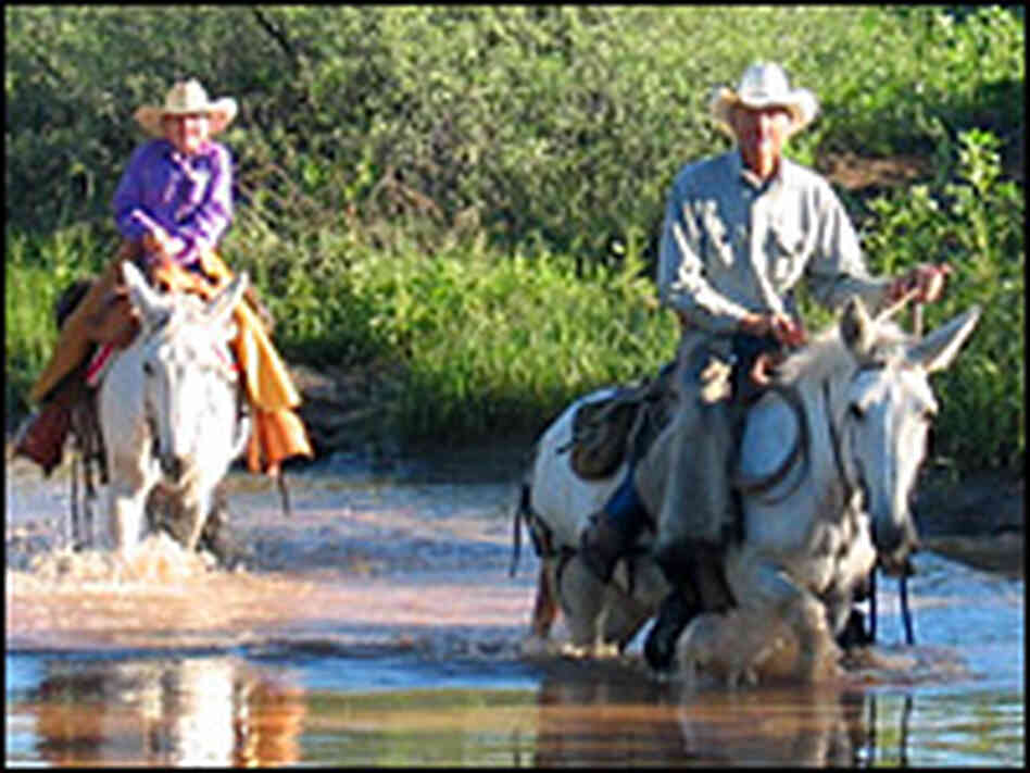 Warner Glenn rides with his granddaughter Mackenzie Warner Glenn rides with his granddaughter Mackenzie