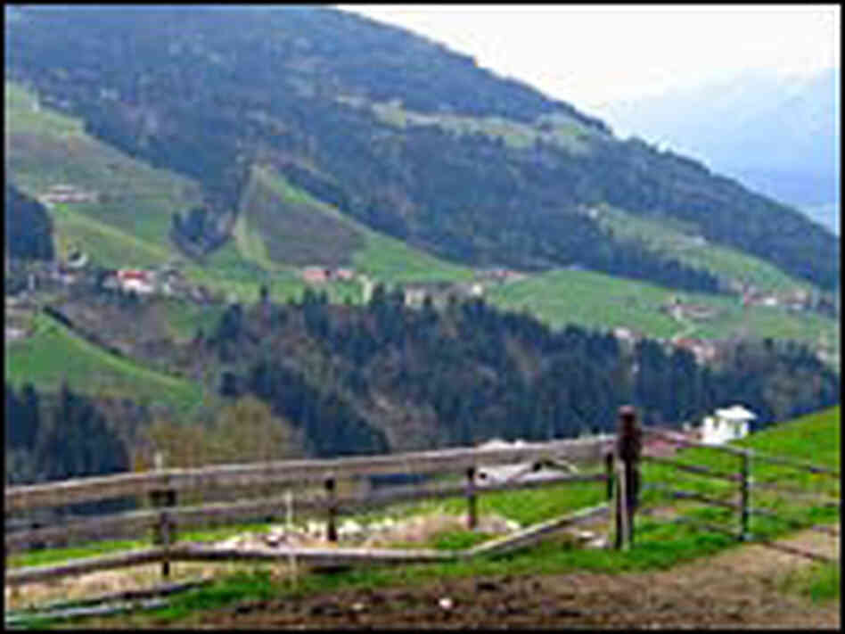 Mountainside farms near Innsbruck, Austria. Mountainside farms near Innsbruck, Austria.