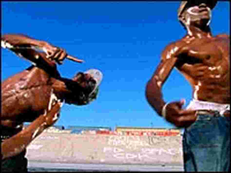 Krumpers glisten with sweat in a scene from the documentary 'Rize' Krumpers glisten with sweat in a scene from the documentary 'Rize'