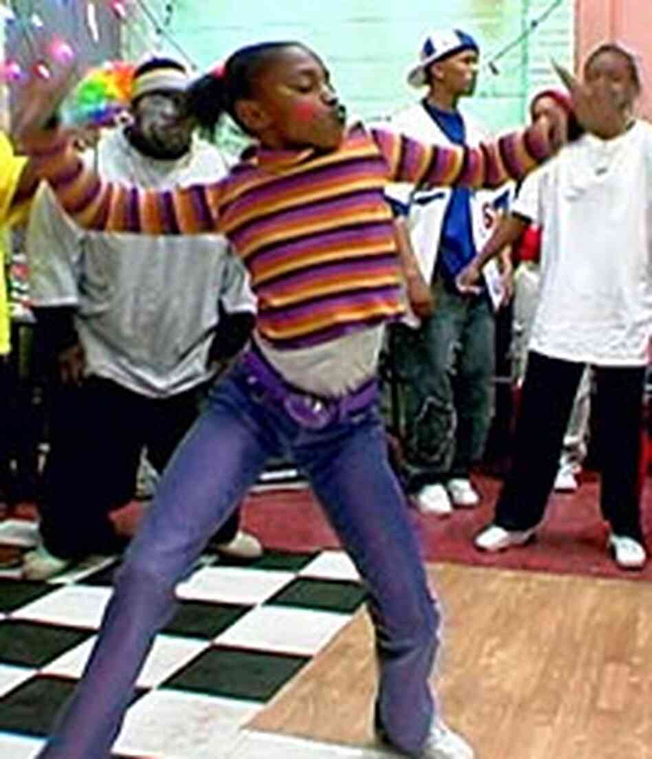 The next generation? A young clown krumper struts her stuff at a youth party. The next generation? A young clown krumper struts her stuff at a youth party.