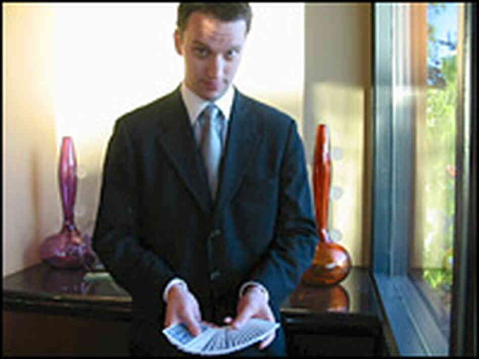 The magician's challenge: Rudd fans the cards before a performance. The magician's challenge: Rudd fans the cards before a performance.