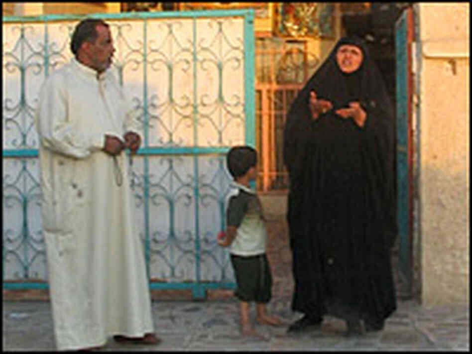 An Iraqi family pleads with American soldiers to improve electric and other services in Sadr City. An Iraqi family pleads with American soldiers to improve electric and other services in Sadr City.