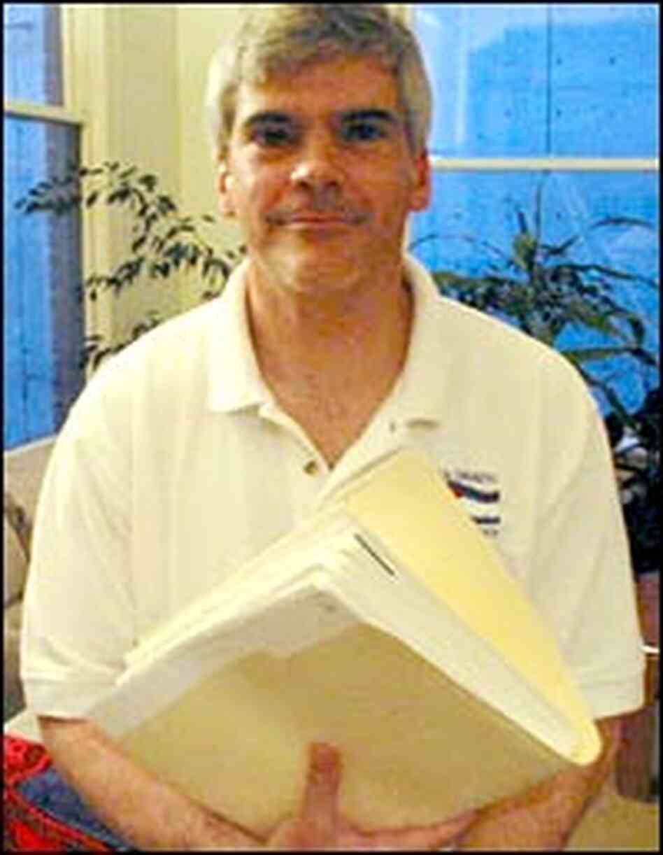 John Scanlan with his collection of rejection letters from law firms. John Scanlan with his collection of rejection letters from law firms.