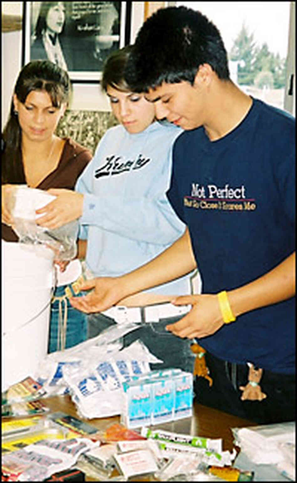 Tolowa Indian Tribe students preparing Tsunami-ready kits. Credit: Cindy Carpien, NPR. Tolowa Indian Tribe students preparing Tsunami-ready kits. Credit: Cindy Carpien, NPR.