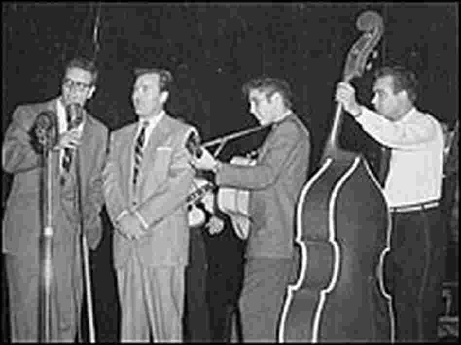 WERE radio personalities Bill Randle and Tommy Edwards, Elvis Presley and bass player Bill Black.