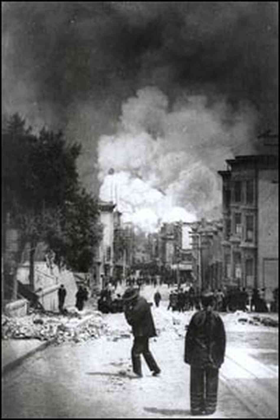 Onlookers watch the fire following the 1906 earthquake.