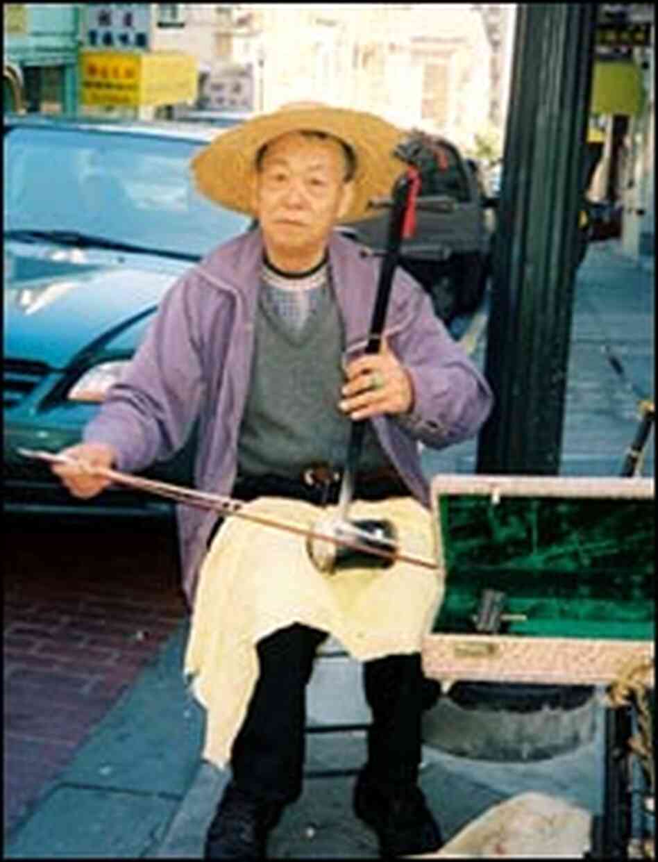 A musician on Grant Avenue in Chinatown. 