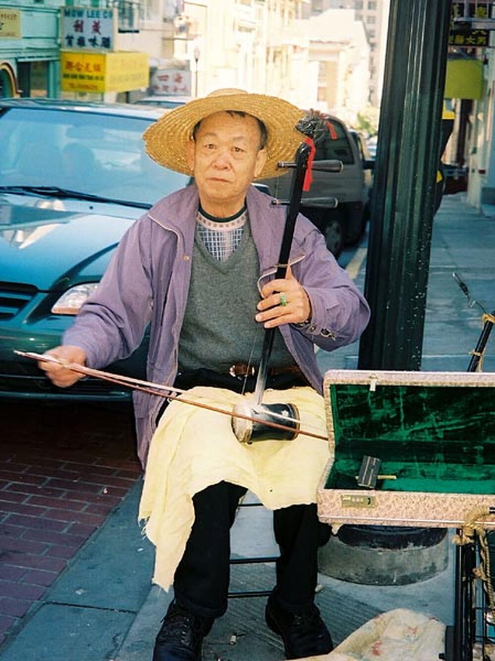 A musician on Grant Avenue in Chinatown. 