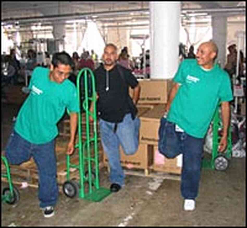 Every afternoon, American Apparel workers stop to stretch -- there's also roving massagers.