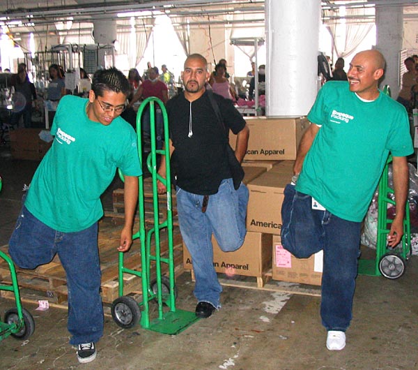 Every afternoon, American Apparel workers stop to stretch -- there's also roving massagers.
