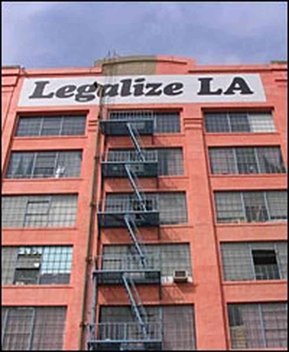 Sign on the American Apparel garment factory in downtown Los Angeles. Sign on the American Apparel garment factory in downtown Los Angeles.