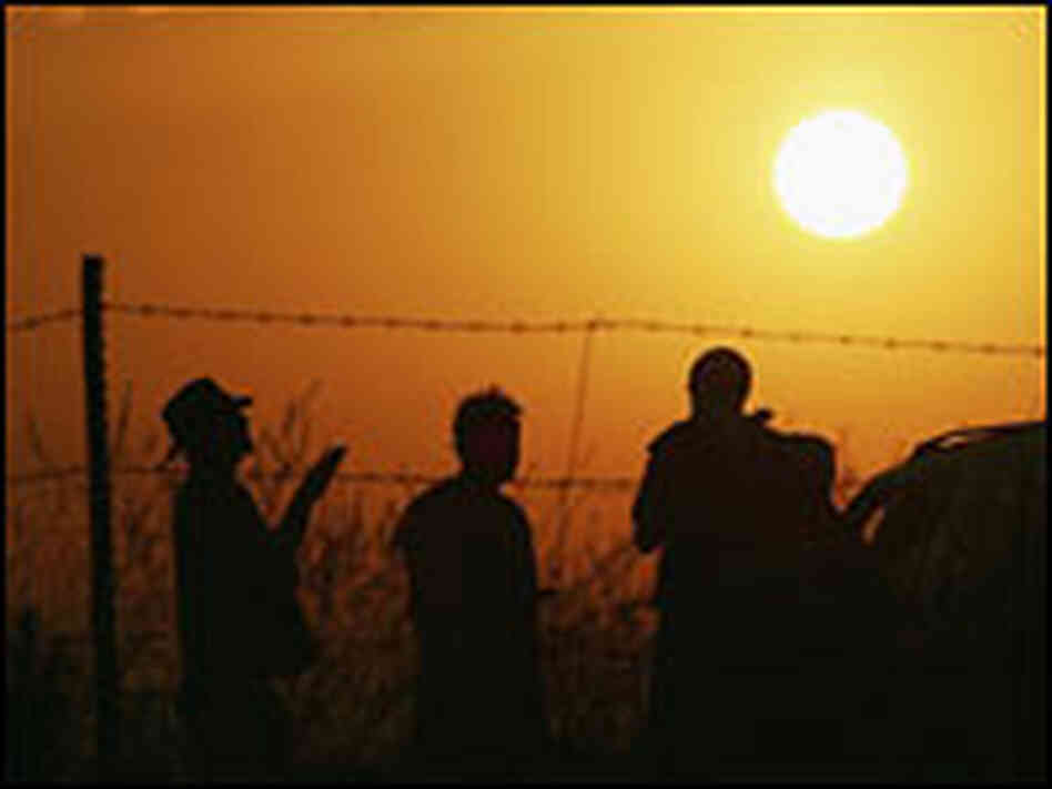 Citizen volunteers prepare for a nightly patrol for people crossing into the U.S. illegally Citizen volunteers prepare for a nightly patrol for people crossing into the U.S. illegally