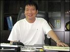 Wang Chunqiao, sitting behind his desk. Wang Chunqiao, sitting behind his desk.