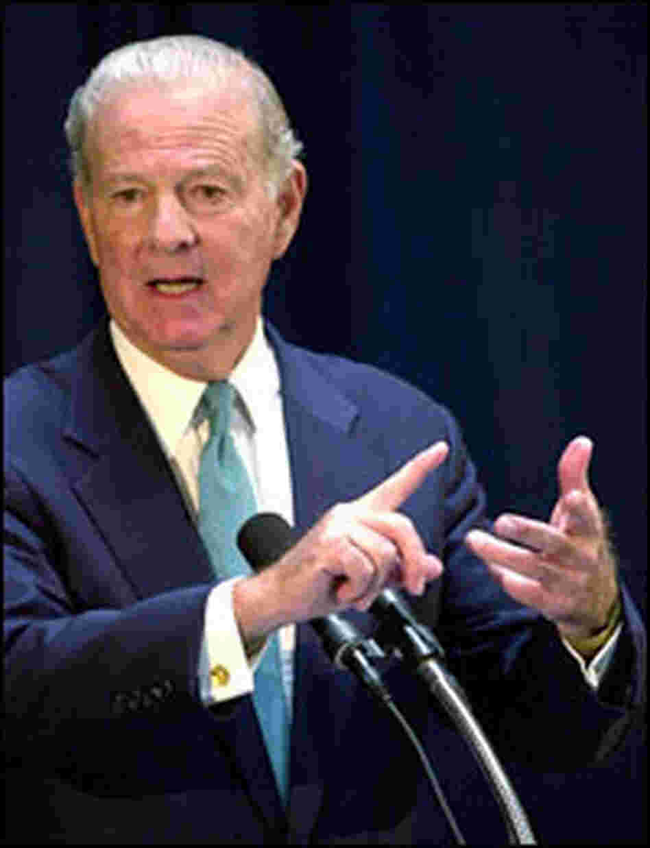 James Baker speaks with reporters at a November 2000 press conference in Tallahassee, Fla.