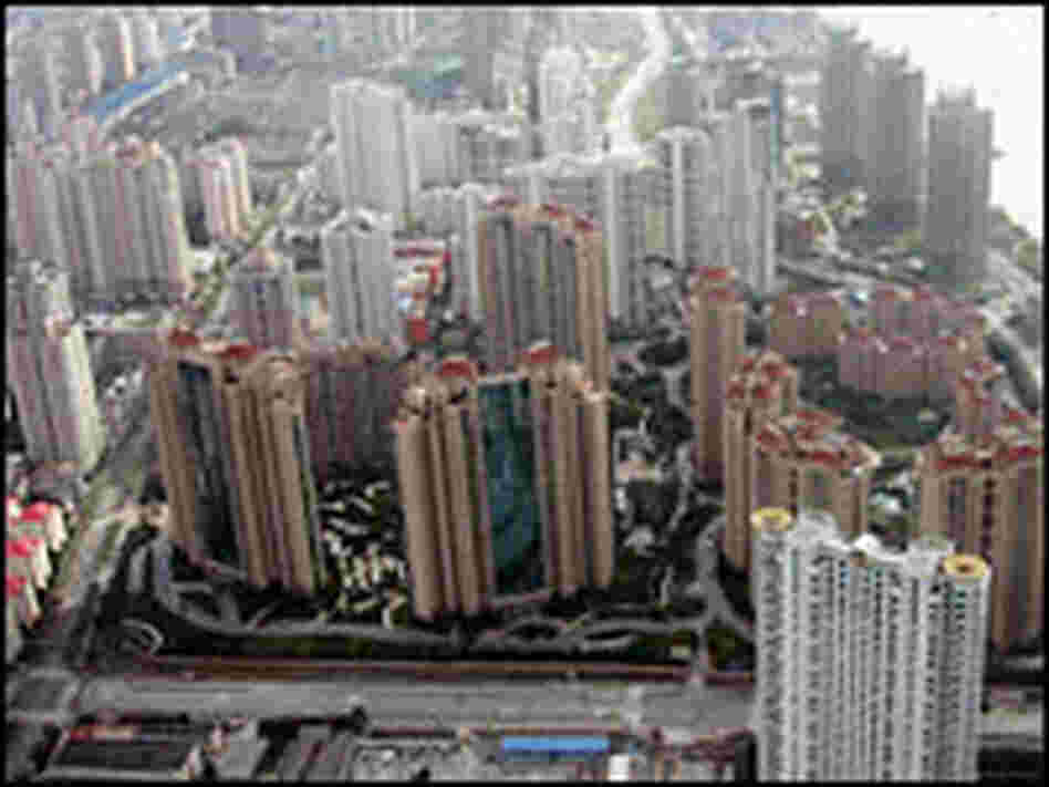 From an 88th-floor observation deck in Pudong, skyscrapers stretch into the distanc