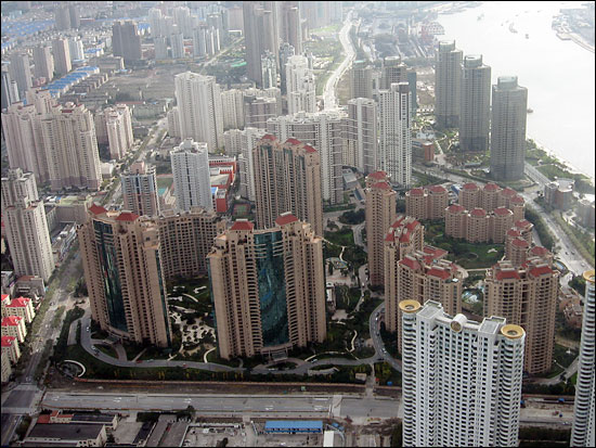 From an 88th-floor observation deck in Pudong, skyscrapers stretch into the distanc