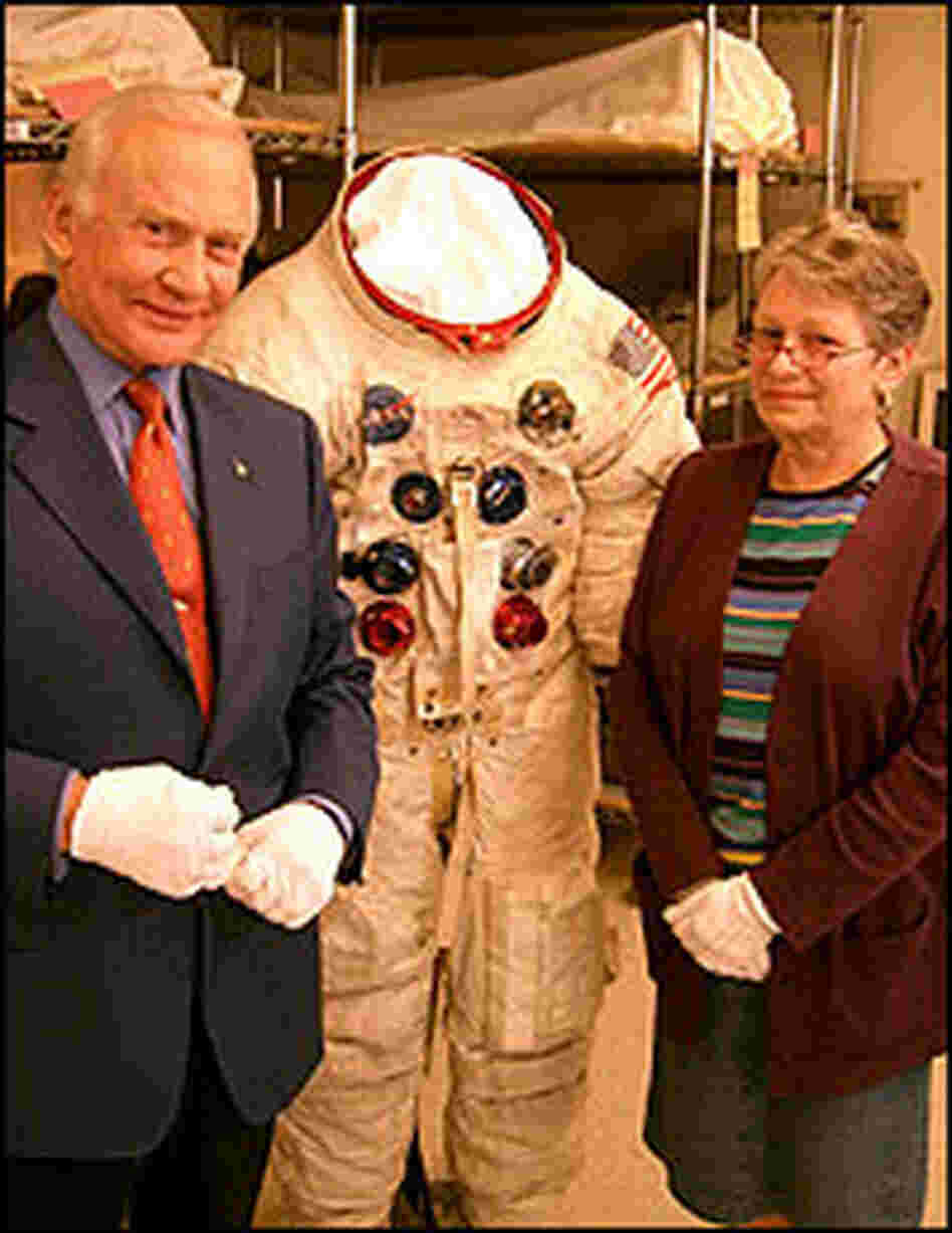 National Air and Space Museum specialist Amanda Young with Buzz Aldrin and his Apollo 11 spacesuit.