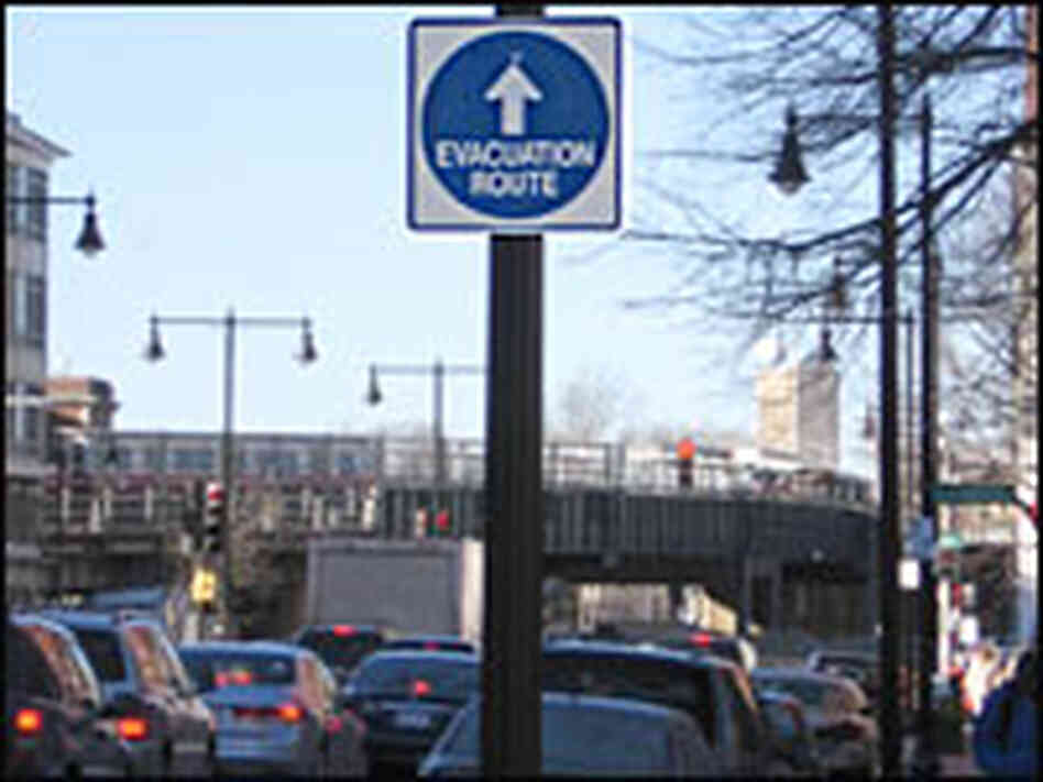 New signs posted on every major thoroughfare in downtown Boston point to evacuation routes. New signs posted on every major thoroughfare in downtown Boston point to evacuation routes.