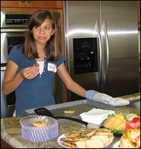 Daughter 'Danny' makes cookies in the kitchen.