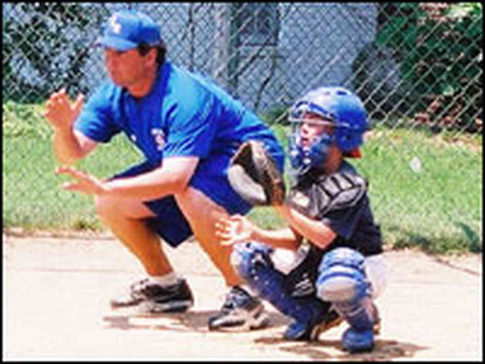 John McCarthy and camper at his Friendship Park baseball camp. John McCarthy and camper at his Friendship Park baseball camp.