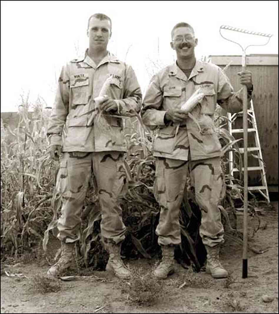 Sgts. Justin Wanzek and Carl Quam Jr. pose with their corn crop. Sgts. Justin Wanzek and Carl Quam Jr. pose with their corn crop.