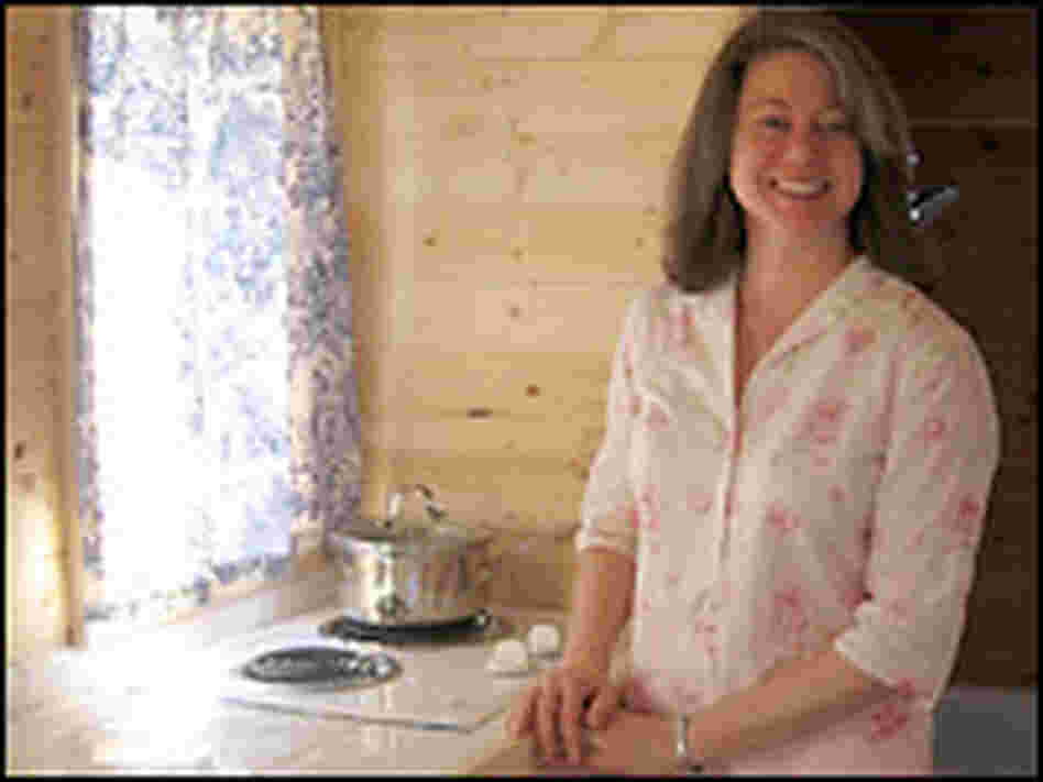 Julie Martin with her tiny home in Mississippi. Cheryl Corley, NPR. Julie Martin with her tiny home in Mississippi. Cheryl Corley, NPR.