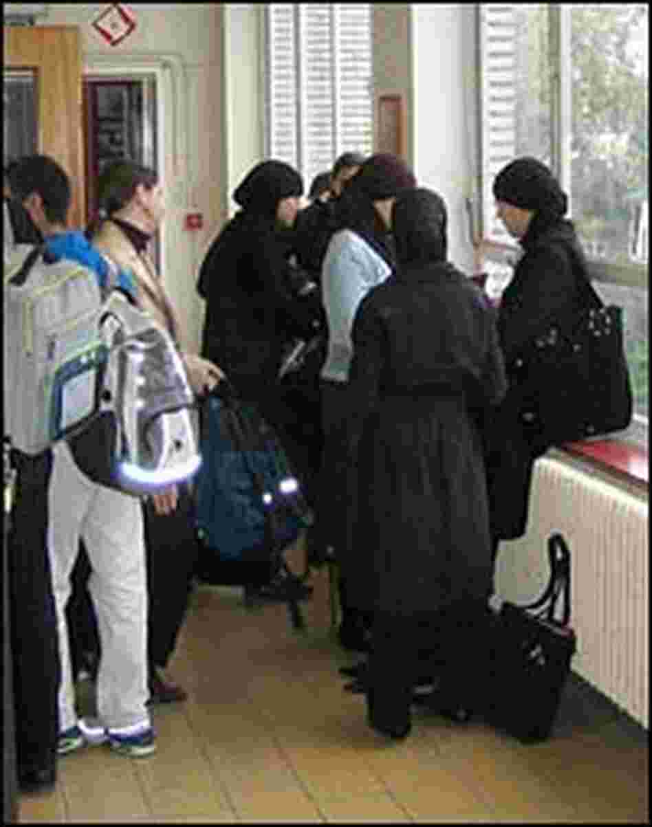 Students gather in a hallway of Koninjlik High School.