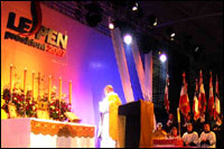 A Catholic priest celebrates mass at the National Front presidential convention near Paris.