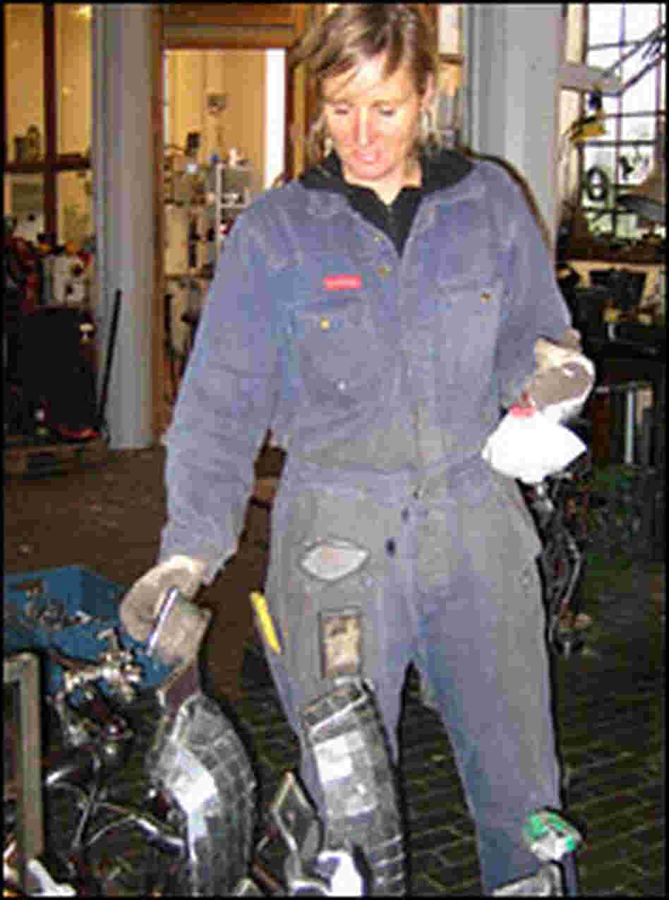 Charlotte Steem in a welding shop.