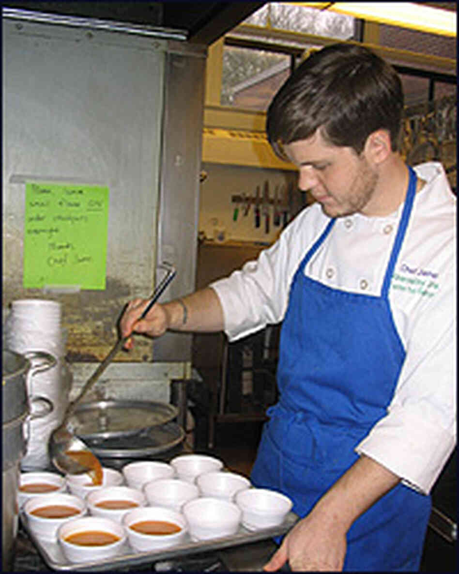 School chef James Fowler ladles out the soup of the day: carrot. School chef James Fowler ladles out the soup of the day: carrot.