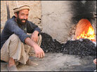 Abdul Wahkeel and his new kiln. Abdul Wahkeel and his new kiln.