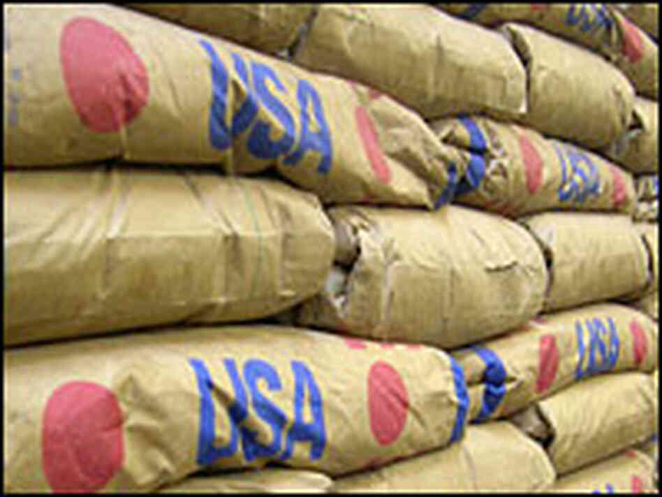 Bags of U.S. cornmeal are stacked in a Malawi warehouse.