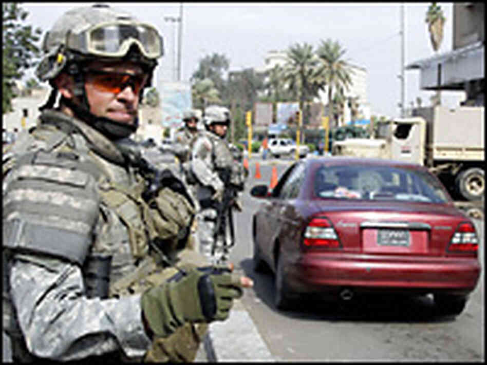 A U.S. soldier operates a checkpoint setup around the Karrada neighbourhood of central Baghdad on Tu A U.S. soldier operates a checkpoint setup around the Karrada neighbourhood of central Baghdad on Tu