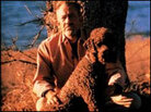 John Steinbeck and his poodle. John Steinbeck and his poodle.