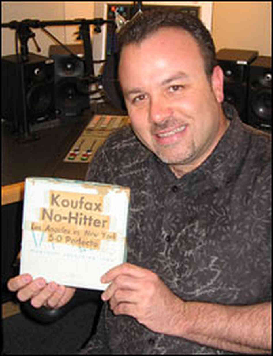 Jim Governale holds the reel-to-reel tape box.