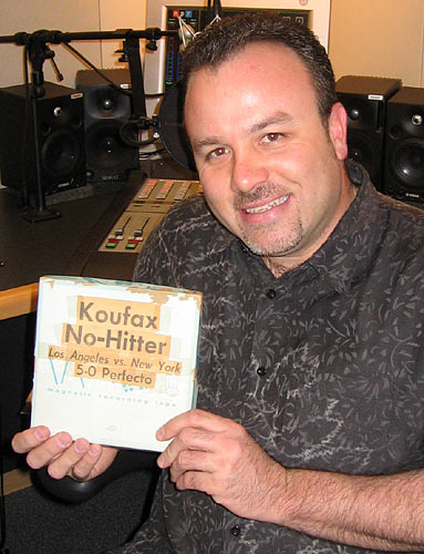 Jim Governale holds the reel-to-reel tape box.
