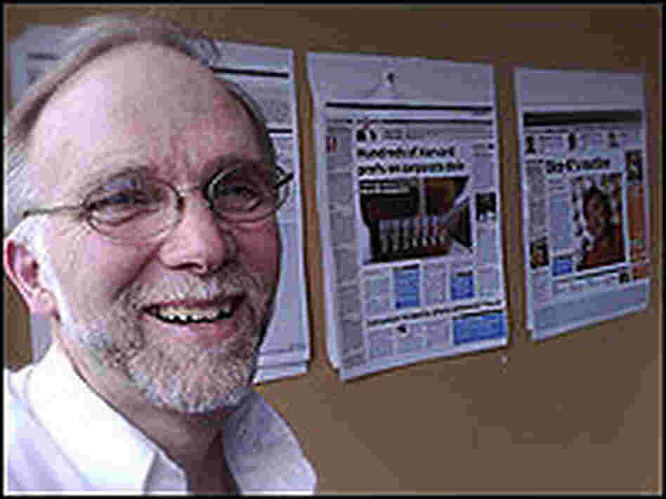 Editor in Chief John Wilpers and his paper. Editor in Chief John Wilpers and his paper.