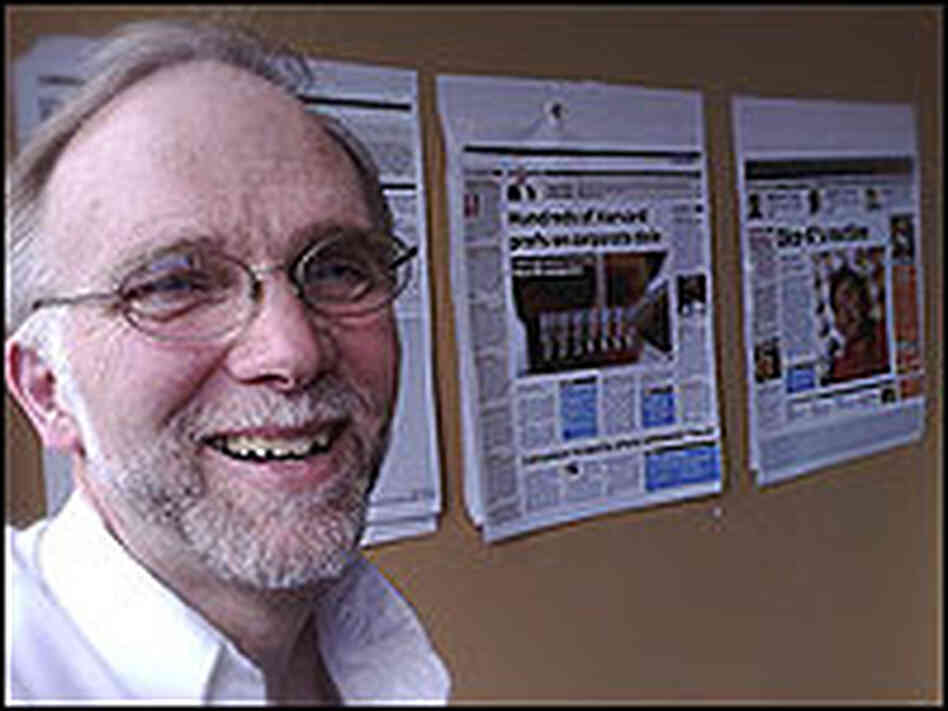 Editor in Chief John Wilpers and his paper. Editor in Chief John Wilpers and his paper.