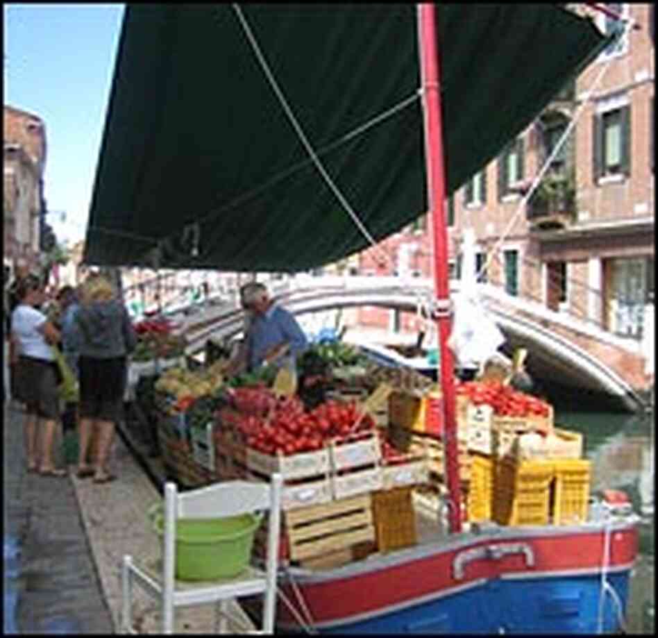 Groceries are sold from a barge.