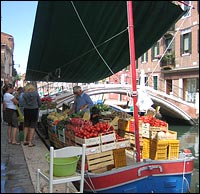 Groceries are sold from a barge.