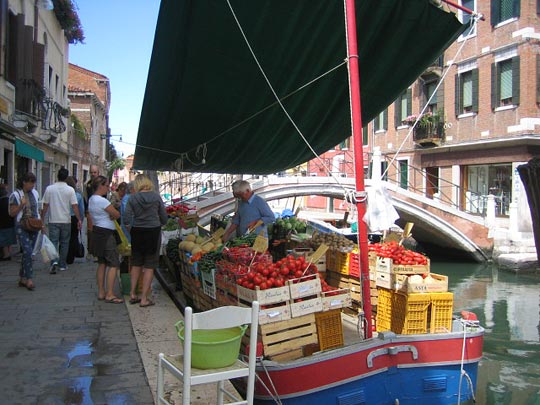 Groceries are sold from a barge.