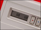 Thermostat with buttons to adjust temperature. Thermostat with buttons to adjust temperature.