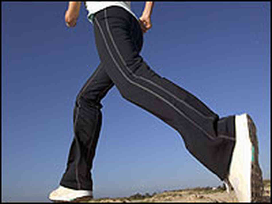 A woman jogging. A woman jogging.