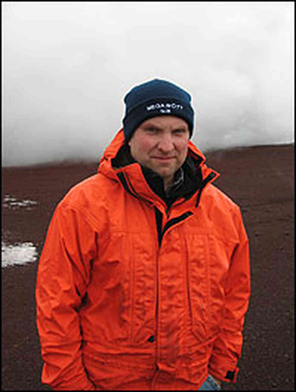 Engineer Bjarni Palsson stands in front of manmade steam geyser Engineer Bjarni Palsson stands in front of manmade steam geyser